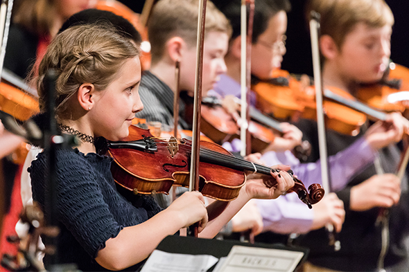 Children playing fiddles/violins