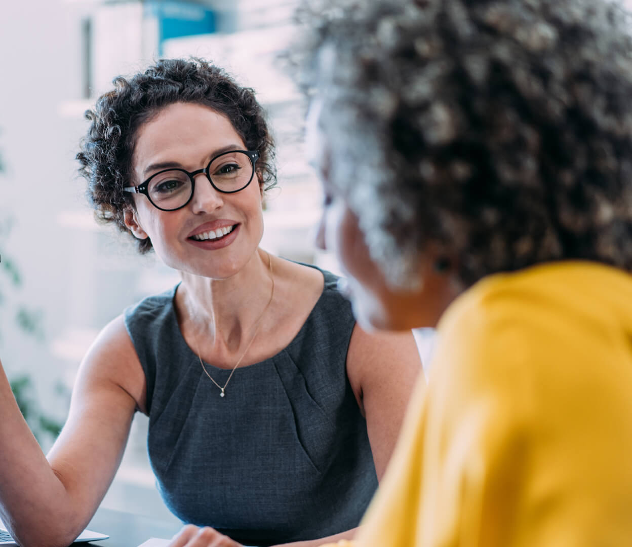 Two women having a conversation.