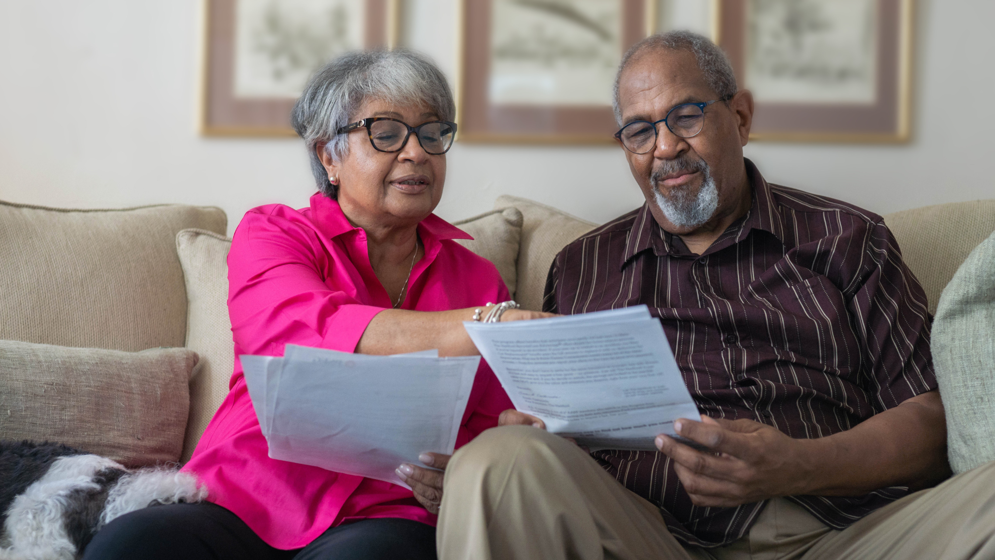Older couple looking at paperwork, a trillion dollar windfall.