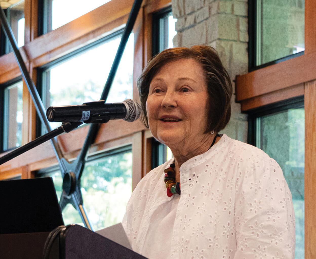 Photo of Sandra Richardson at a lecturn speaking